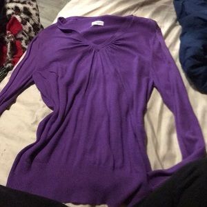 This purple sweater